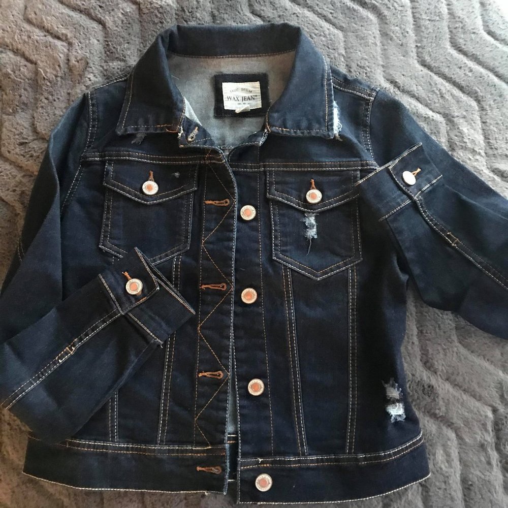 Distressed blue jean jacket “wax jean” brand